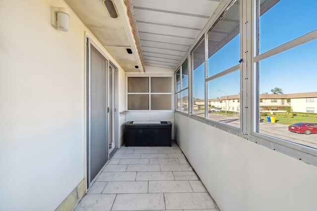 interior space featuring beamed ceiling