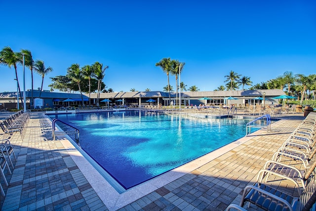 view of swimming pool with a patio area