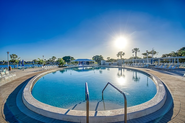 view of swimming pool with a patio area