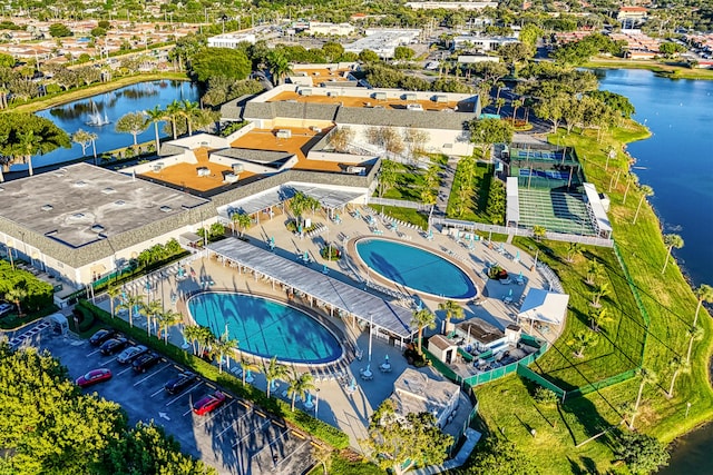 bird's eye view with a water view