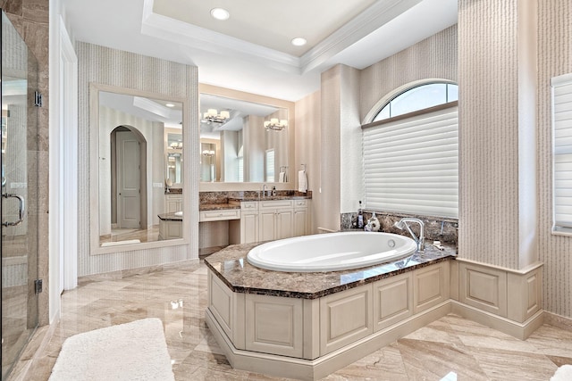 bathroom with wallpapered walls, crown molding, marble finish floor, and a bath