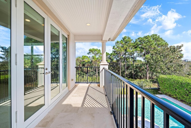 balcony featuring french doors