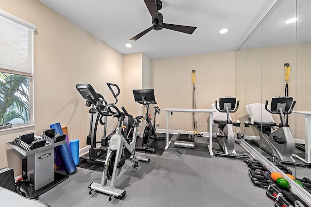 workout area featuring baseboards, a ceiling fan, and recessed lighting