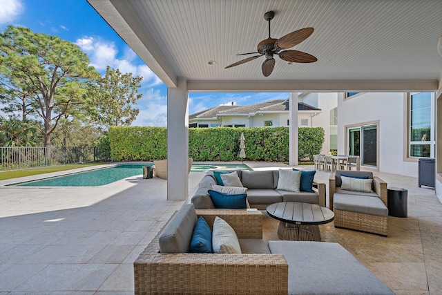 view of patio / terrace featuring a fenced in pool, outdoor dining area, a ceiling fan, a fenced backyard, and an outdoor living space