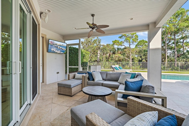 view of patio / terrace with ceiling fan, a fenced backyard, an outdoor hangout area, and a fenced in pool