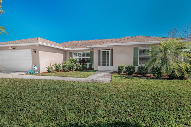 ranch-style house with a front yard and a garage