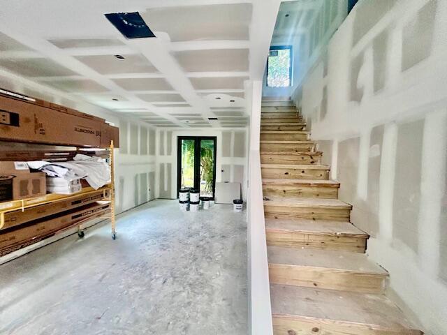 6991 NW 30th Ter Unit A, Fort Lauderdale, FL 33309 - stairway with healthy amount of natural light and french doors