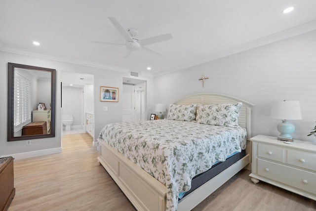 bedroom featuring ensuite bath, ceiling fan, ornamental molding, and light wood-type flooring