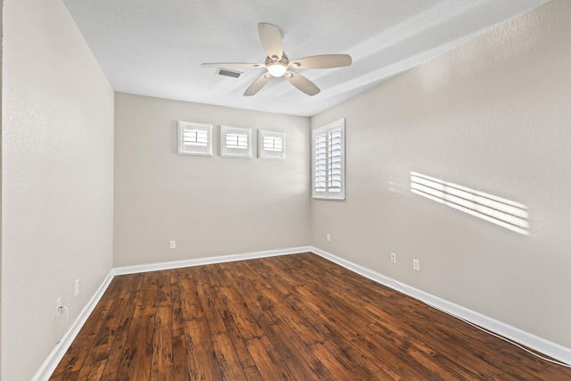 unfurnished room with hardwood / wood-style floors, a textured ceiling, and ceiling fan