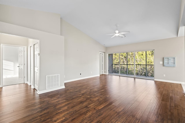 empty room with ceiling fan, high vaulted ceiling, and dark wood-type flooring