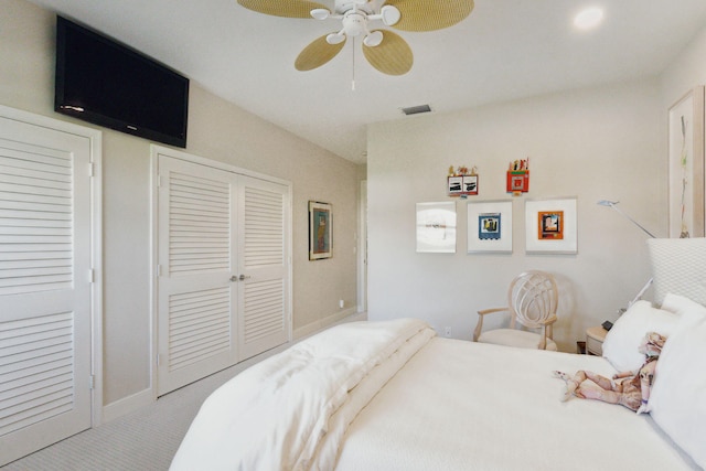 carpeted bedroom with ceiling fan