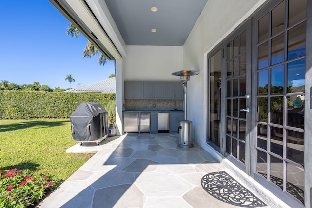 view of patio with a grill