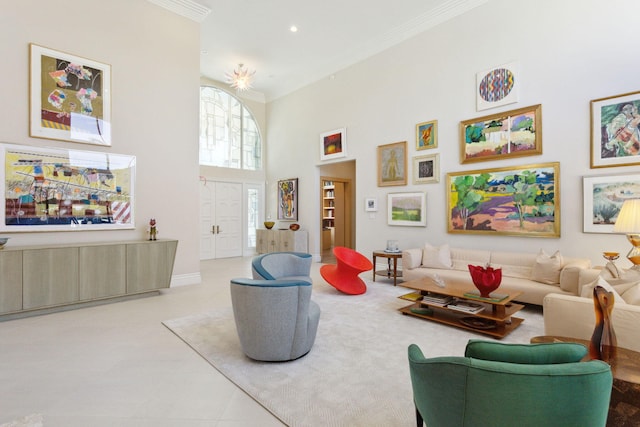 tiled living room with crown molding and a high ceiling