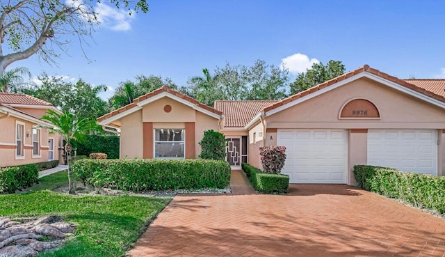 view of front of property with a garage