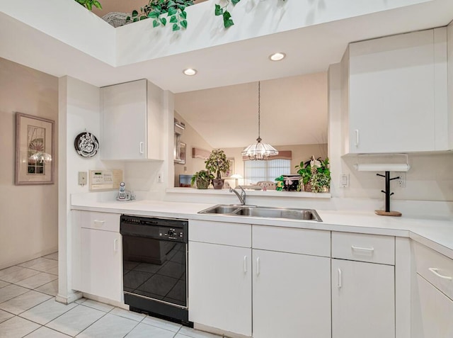 kitchen with dishwasher, sink, hanging light fixtures, vaulted ceiling, and white cabinets