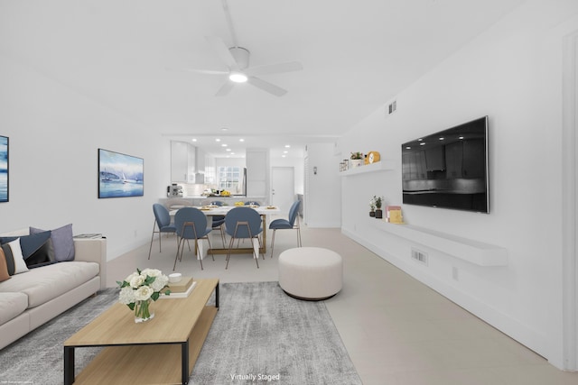 living room featuring ceiling fan