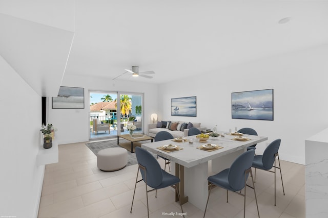 dining space featuring ceiling fan and light tile patterned flooring