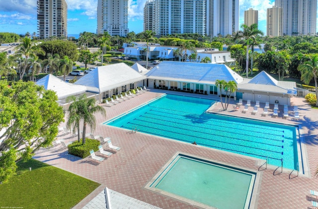 view of swimming pool featuring a patio