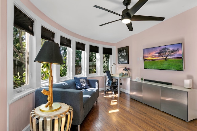 living room with a healthy amount of sunlight, hardwood / wood-style floors, and ceiling fan