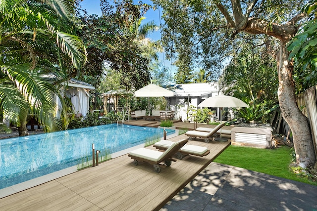 view of pool featuring a patio