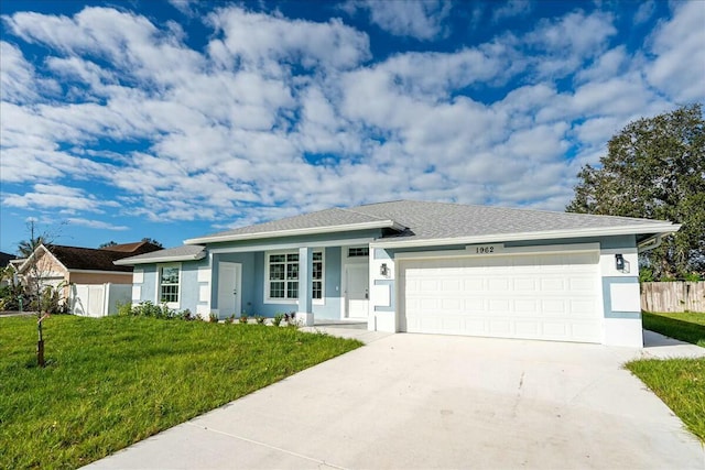 single story home with a front yard and a garage