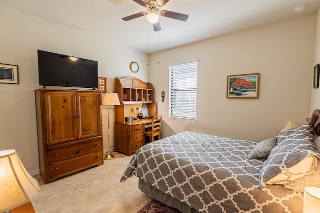 bedroom with light tile patterned floors and ceiling fan