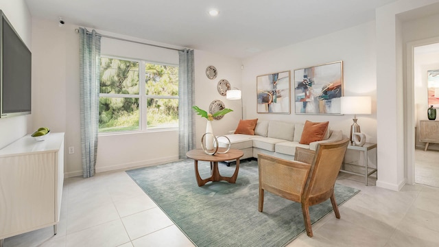 4601 SW Savona Blvd, Port Saint Lucie, FL 34953 - living room with light tile patterned flooring, baseboards, and recessed lighting