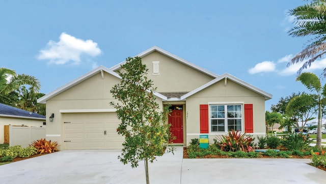 single story home featuring a garage