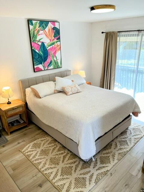 bedroom featuring hardwood / wood-style flooring