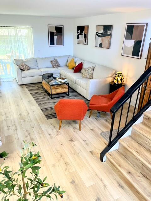 living room with hardwood / wood-style flooring