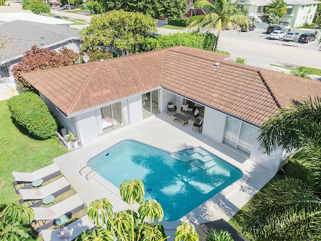 view of pool with a patio area