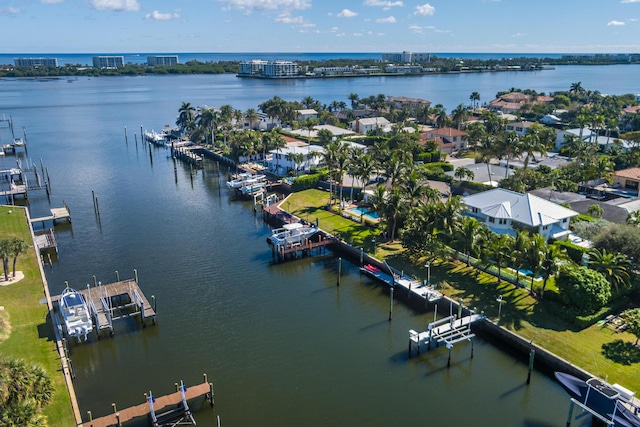 birds eye view of property featuring a water view