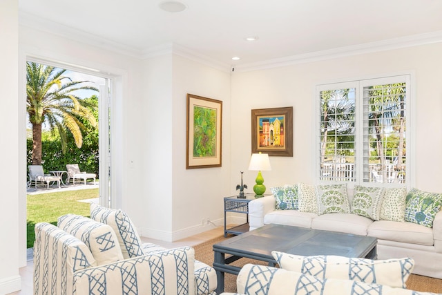 living room featuring a wealth of natural light and crown molding