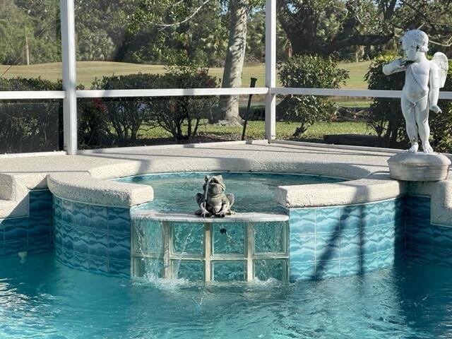 pool with a patio area