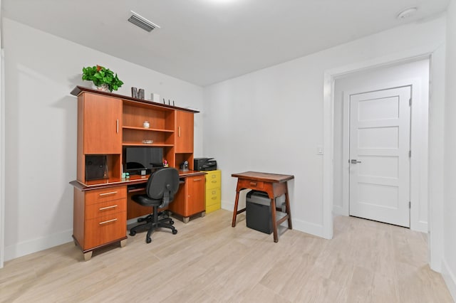 office space featuring light hardwood / wood-style floors