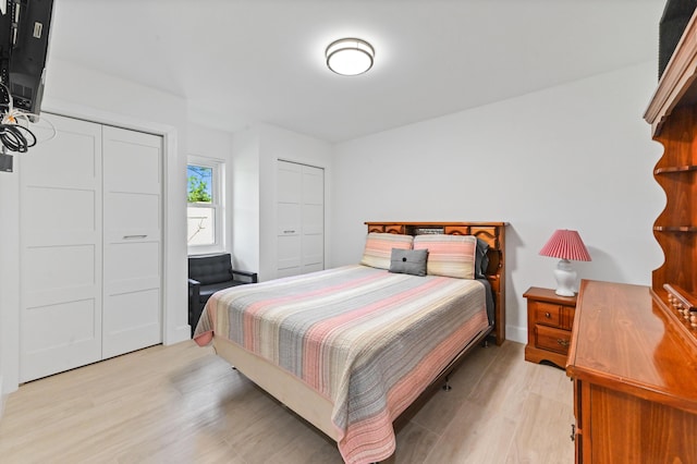 bedroom with light wood-type flooring