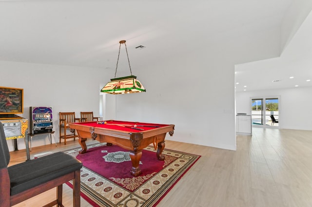 playroom featuring light hardwood / wood-style flooring and billiards