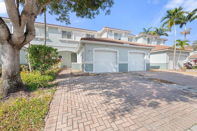 view of front of home with a garage