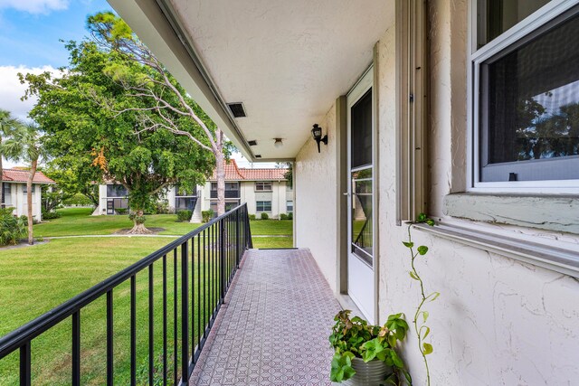 1124 NW 13th St Unit 218A, Boca Raton, FL 33486 - view of patio / terrace featuring a balcony
