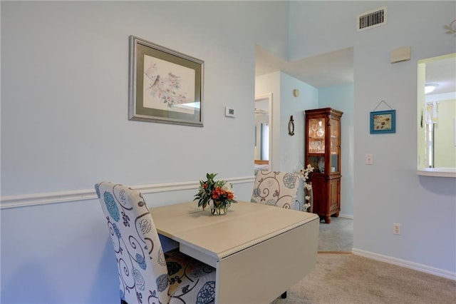 view of carpeted dining area