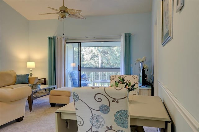 living room with ceiling fan and light carpet