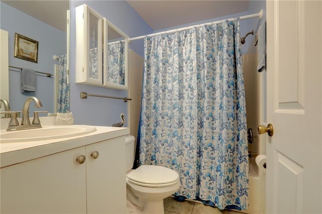 full bathroom featuring tile patterned flooring, vanity, toilet, and shower / bath combo with shower curtain