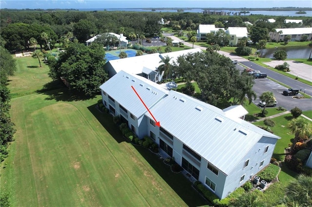 bird's eye view with a water view