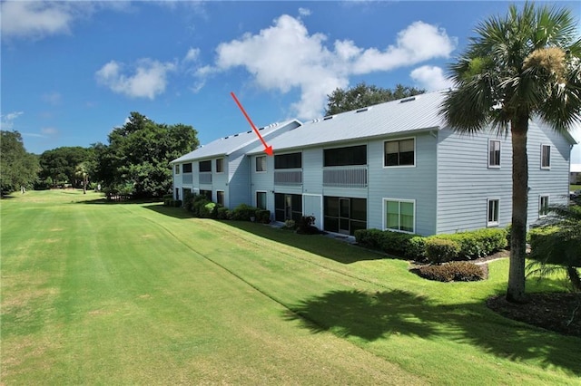 exterior space featuring a lawn