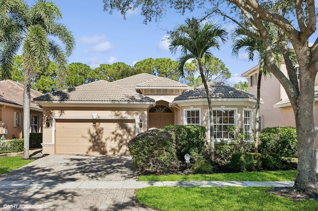 view of front of property featuring a garage