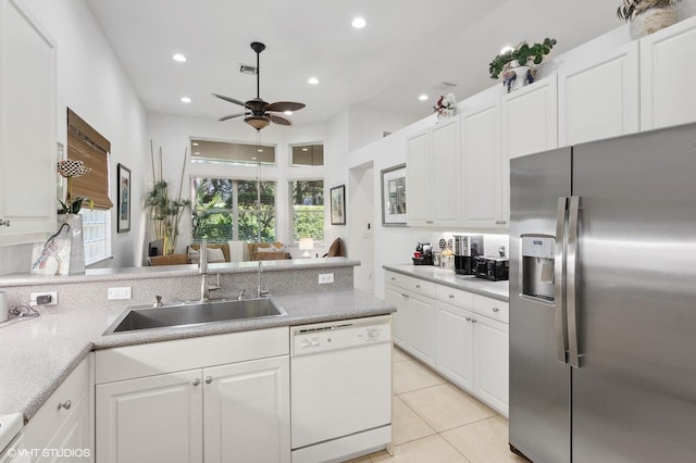 kitchen featuring white cabinetry, dishwasher, ceiling fan, sink, and stainless steel refrigerator with ice dispenser