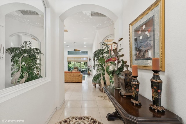 corridor featuring light tile patterned floors