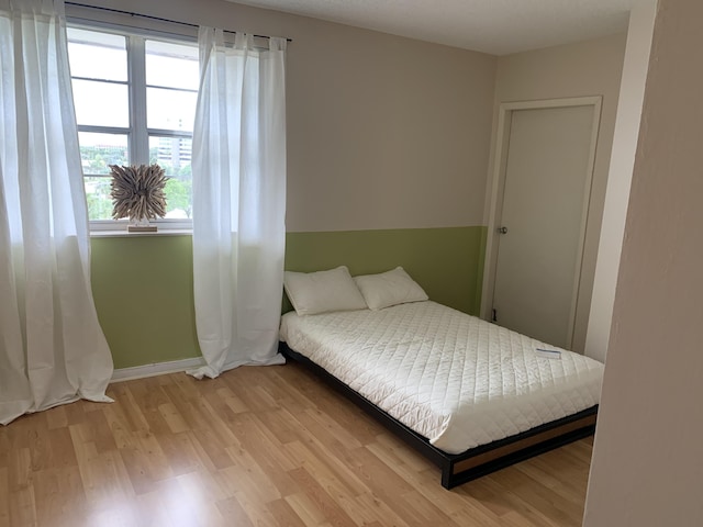 bedroom featuring light hardwood / wood-style floors