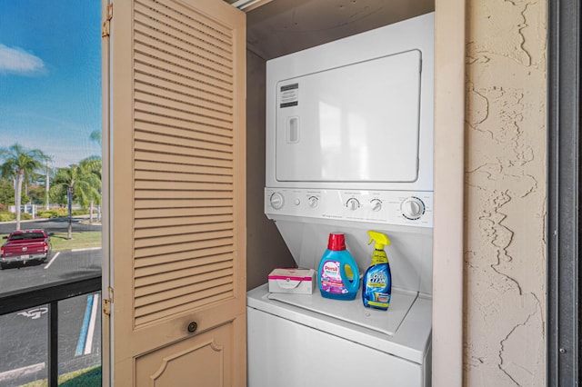 laundry room featuring stacked washing maching and dryer