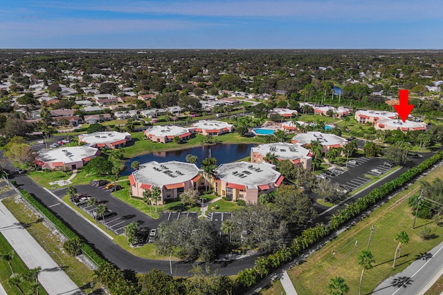 drone / aerial view featuring a water view